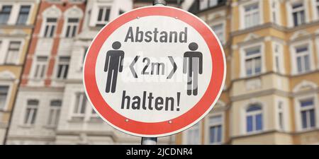 Schild „Halten Sie einen Abstand von 2 m“ (2 m Abstand halten) Stockfoto