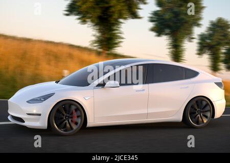 Tesla Model 3 während der Fahrt Stockfoto