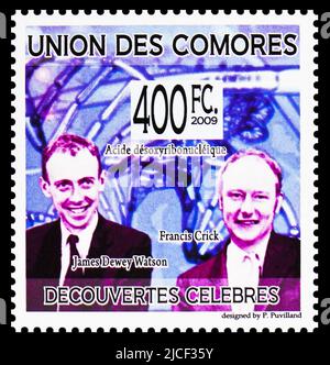 MOSKAU, RUSSLAND - 12. JUNI 2022: Die auf Komoren gedruckte Briefmarke zeigt James Dewey Watson, Francis Crick, Acide desoxyribonucleique, den berühmten Entdecker Stockfoto