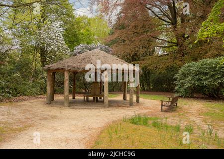 Strohhütte in einem lokalen Park Stockfoto