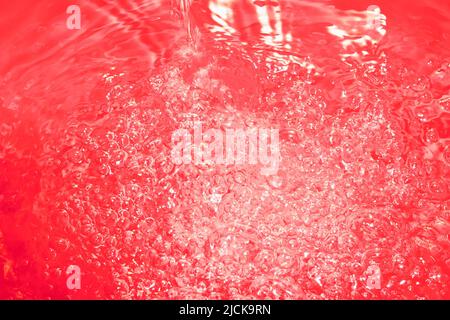Roter abstrakter chaotischer Rückengrund mit nahtlosem Muster. Rote flüssige Oberflächenstruktur. Stockfoto