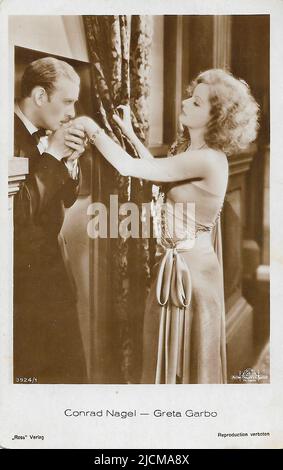 Porträt von Conrad Nagel und Greta Garbo in der geheimnisvollen Lady (1928) - Stille Hollywood-Ära Stockfoto