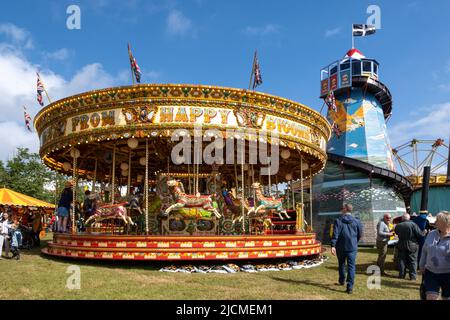 Traditionelle, runde Festlandpferde in leuchtenden Farben im Sonnenschein der Royal Cornwall Show. Immer noch eine Attraktion für alle Altersgruppen Stockfoto