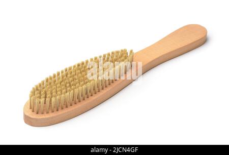 Kleiderbürste aus Naturborsten mit Holzgriff, isoliert auf Weiß Stockfoto