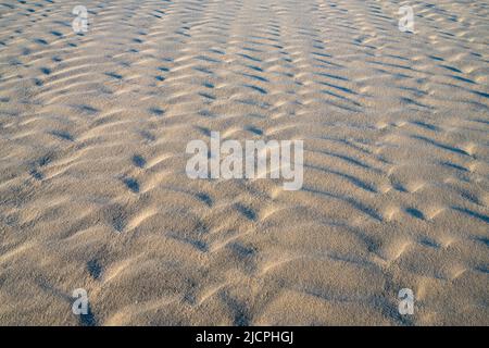Wellenmuster auf den Vordunen auf South Padre Island, Texas. Stockfoto