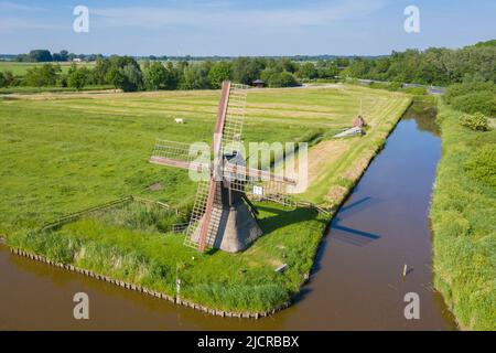 Windmühle Honigfleth. Die letzte Windmühle dieser Art in Schleswig-Holstein. Früher wurden Hunderte von ihnen für die Entwässerung landwirtschaftlicher Flächen genutzt. Deutschland Stockfoto