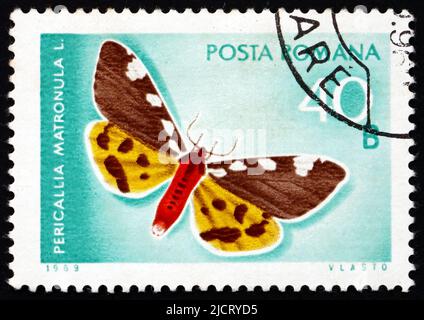 RUMÄNIEN - UM 1969: Eine in Rumänien gedruckte Briefmarke zeigt Pericallia Matronula, Motte, Schmetterling, um 1969 Stockfoto