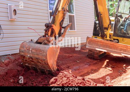 Bagger tun bewegt Boden Bau arbeitet Landschaftsbau arbeitet auf Bau Stockfoto