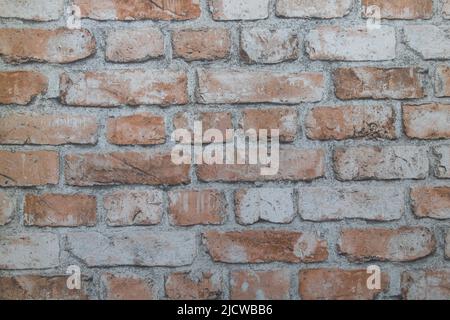 Nahaufnahme eines texturierten Backsteinwands Stockfoto