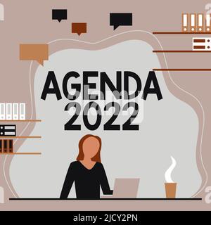 Handschrift unterschreiben Agenda 2022. Geschäftskonzept Liste der Aktivitäten, in denen sie aufgenommen werden sollen Frau am Schreibtisch sitzen arbeiten und präsentieren Stockfoto