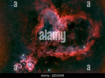 Der Herznebel (IC 1805 oder Sharpless 2-190) ist ein Emissionsnebel im Sternbild Cassiopeia, der etwa 7 500 l.y. von der Erde entfernt liegt. Stockfoto