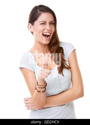 Ich mag dich. Eine schöne junge Frau winkend und zeigt auf die Kamera. Stockfoto
