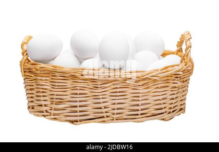 Hühnereier in einem Weidenkorb. Stockfoto