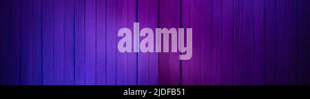 Holzwand in Cyan und Magenta Farben lackiert. Dunkle Oberfläche mit Neonfarben Stockfoto