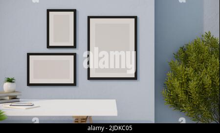 Modernes Wohnzimmer mit leerem leerem Bilderrahmen-Modell zur Anzeige Ihrer Kunstbilder an der blauen Wand und einem Kopierplatz auf weißer Tischplatte. Close-U Stockfoto