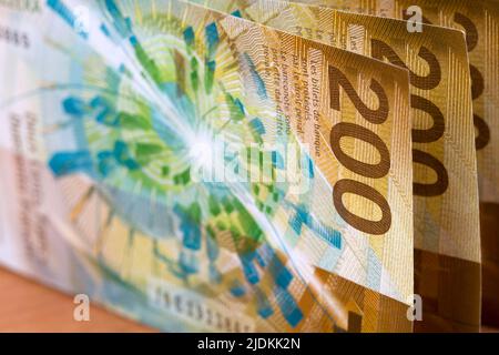 Schweizer Geld - 200 Franken - ein geschäftlicher Hintergrund Stockfoto