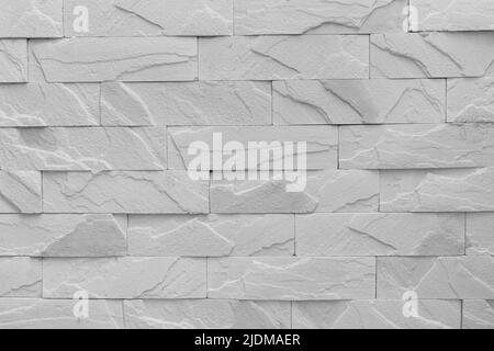 Ziegelwand Shell Material grau Ton Textur coquina Hintergrund. Stockfoto