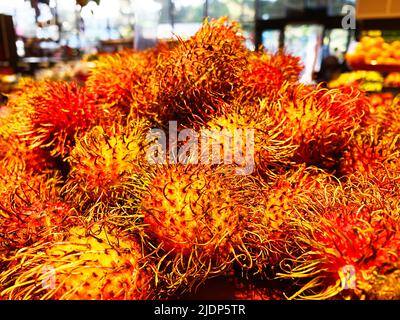 Rambutan Obst im Supermarkt Stockfoto