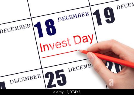 18. Tage im Dezember. Hand zeichnen rote Linie und schreiben Sie den Text Invest Day am Kalenderdatum 18. Dezember. Geschäfts- und Finanzkonzept. Wintermonat Stockfoto