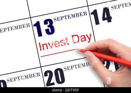 13. Tage im September. Hand zeichnen rote Linie und schreiben Sie den Text Invest Day am Kalenderdatum 13. September. Geschäfts- und Finanzkonzept. Herbstmons Stockfoto