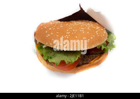 Hamburger mit Ketchup auf weißem Hintergrund. Stockfoto