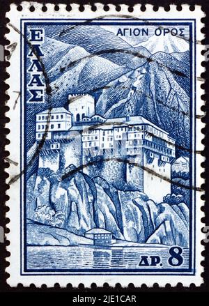 GRIECHENLAND - UM 1961: Eine in Griechenland gedruckte Briefmarke zeigt Klöster vom Berg Athos, um 1961 Stockfoto