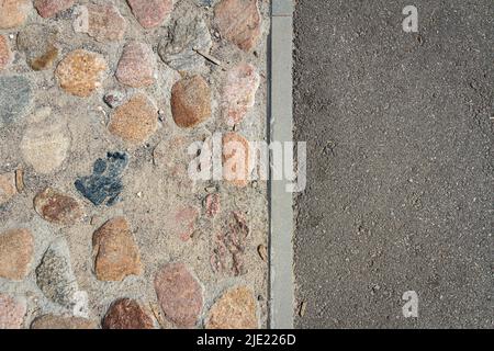 Alte Kopfsteinpflaster und Asphalt Texturen Hintergrund Stockfoto