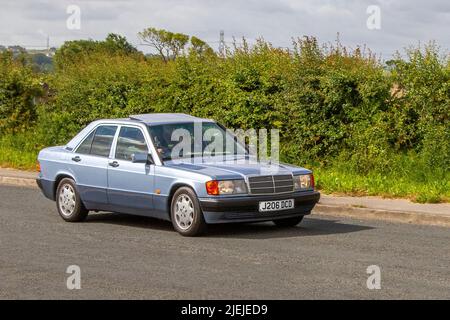 1991 90s Neunzigs Blue Mercedes Benz 190E Auto 1997cc Limousine; unterwegs zum Hoghton Tower zum Supercar Summer Showtime Car Meet, das von Great British Motor Shows in Preston, Großbritannien, organisiert wird Stockfoto