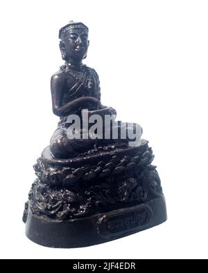 Alte Buddha-Statue isoliert auf weißem Hintergrund. Der Name der Buddha-Statue ist Upagupta. Stockfoto