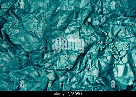 Zerknittert alt recycelt leer grün blau Papier Hintergrund. Umweltfreundliches Design, umweltfreundliches Konzept für Ihr Banner. Stockfoto