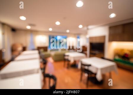 Verschwommenes Bild von Cafe mit bokeh Hintergrund. Stockfoto