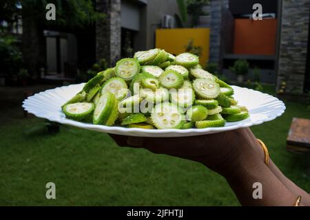 Spitzkürbis, kantola, Spinygourd, Kürbis, Arten von Kürbis, Vielfalt, indisches Gemüse, Gemüse, grünes Gemüse, geschnitten, Gehackt, geschnitten, indisch, asisätiert Stockfoto