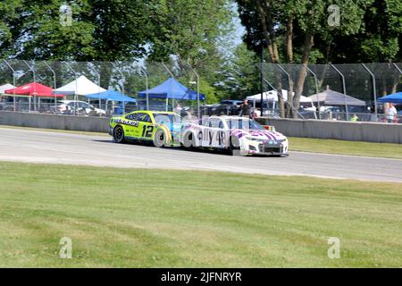 Elkhart Lake, Wisconsin - 3. Juli 2022: Kwik Trip 250 präsentiert von JOCKEY Made in America. Alex Bowman Nr. 48 Hendrick Motorsports führt Ryan knapp an Stockfoto