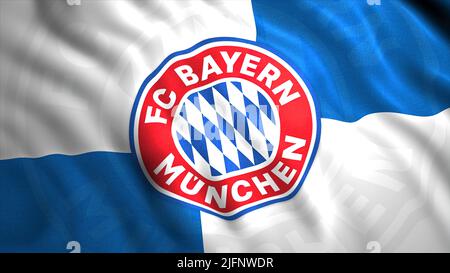 Winkende Flagge mit Emblem des deutschen Fußballvereins. Bewegung. Schöne 3D Flagge flattert im Wind mit Logo des Fußballvereins. Logo des deutschen Fußballvereins Stockfoto