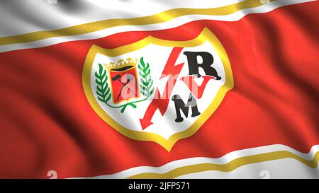 Flaggen des spanischen Fußballvereins. Bewegung. Wunderschön winkende 3D Flagge mit Logo des Fußballvereins. Wappen des spanischen Fußballvereins Rayo Vallecano auf der Flagge Stockfoto