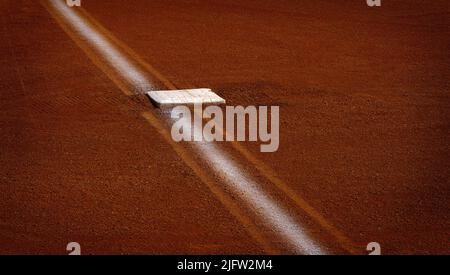 Baseball base und Geweißt base line in Diamant Stockfoto