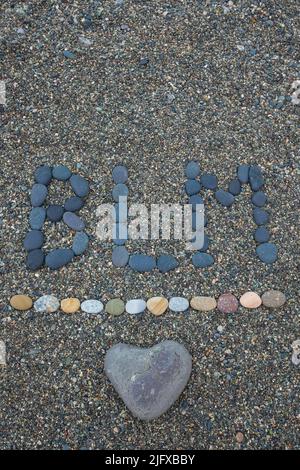 Schriftzug BLM Schwarz lifes Materie aus Steinen.. Konzept der Beendigung von Rassismus und Diskriminierung. Stockfoto