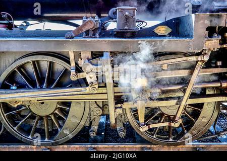 Räder und Pleuel der Dampflokomotive auf der Poppy Line in Sheringham. Stockfoto