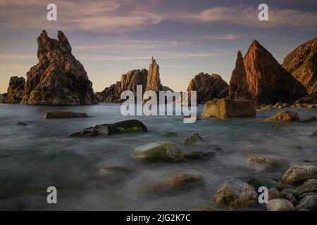 Mangersta Meer Stapel bei Sonnenuntergang auf der Isle of Lewis, Äußere Hebriden. Stockfoto