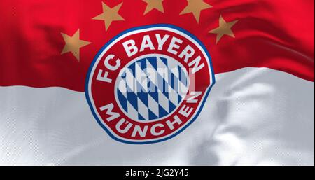 München, GER, Mai 2022: Stoffhintergrund mit der Bayern München Flagge winken. Bayern München ist ein deutscher Sportverein mit Sitz in München Stockfoto