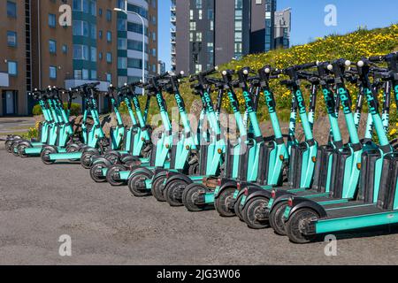 Elektroroller in Reykjavík geparkt Stockfoto