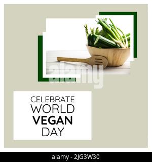 Composite aus Celebrate World vegan Day Text und rohes grünes Gemüse in Schüssel mit Löffel auf dem Tisch Stockfoto