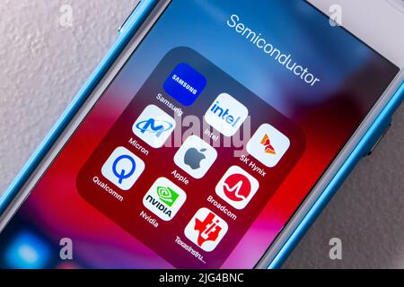 Beliebte Halbleitermarken, Samsung, Intel, SK Hynix, Micron Technology, Apple Inc, Broadcom, Qualcomm, Nvidia und Texas Instruments auf einem iPhone Stockfoto