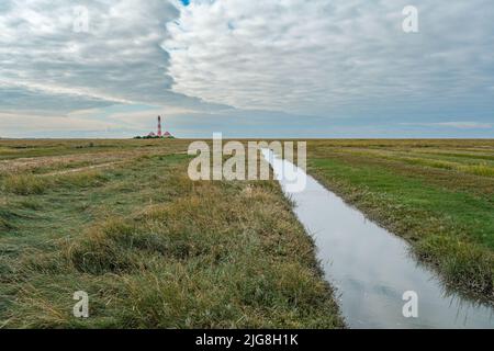 Leuchtturm Westerhever an der Nordsee, Deutschland. Direkt am Wattenmeer, ein Welterbe. Stockfoto