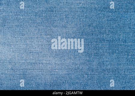 Textur Denim Hintergrund, Nahaufnahme Jeans, Details Linienmuster, Stoffoberfläche, blaue Stofftapete, Raues Material Stockfoto