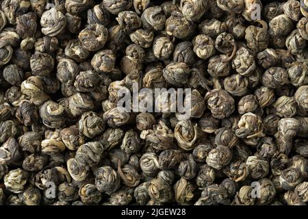 Chinesische Jasmine Dragon Perle Tee Nahaufnahme Vollformat als Hintergrund Stockfoto