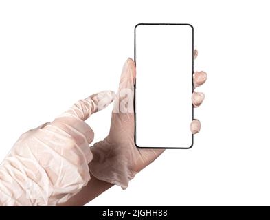 Zeigefinger des Arztes, der auf einen Handymockup zeigt, isoliert auf weißem Hintergrund. Anwendungen zur Gesundheitsverfolgung im Smartphone, in der medizinischen Online-Diagnostik und in der Behandlung. Hochwertige Fotos Stockfoto