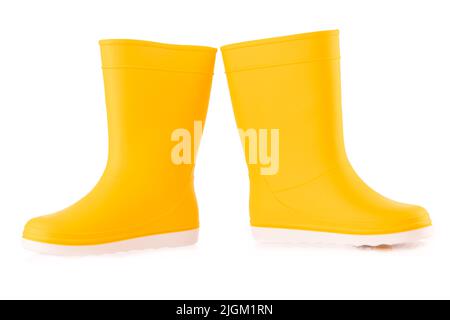 Gelbe Gummistiefel isoliert auf weißem Hintergrund. Kinderschuhe. Stockfoto