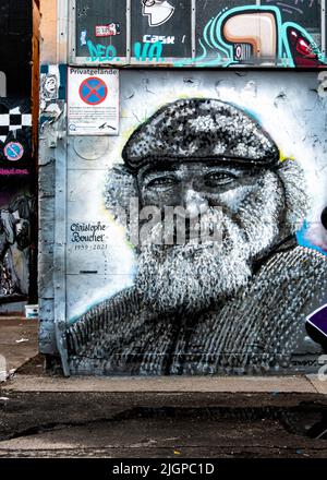 Christophe Bouchet Gedenkbild auf altem Eisenbahngebäude in DER ROHEN Gelände, Revaler Straße.Friedrichshain, Berlin Stockfoto