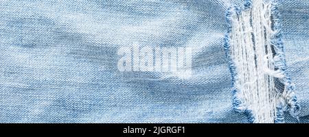 Hellblau zerrissen Jeans Textur Hintergrund Stockfoto